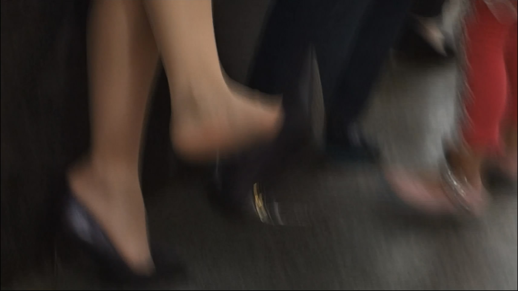 Dangling mother beside baby stroller 